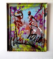 Full front view of painting and wood frame