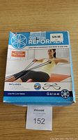 Front of box showing CorePlus Reformer branding, image of resistance bands being used, and pricing sticker indicating $29.99.
