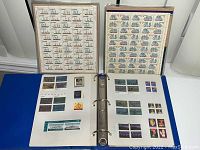 Overview showing uncut sheets and binder