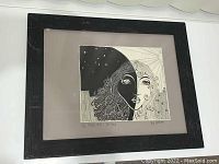 Framed ink drawing showing full artwork and frame with wear.