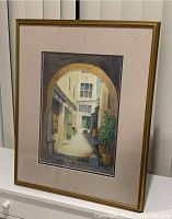 Full view of the framed watercolour painting showing the entire artwork in a gold frame with matting.