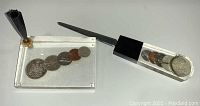 View of entire set showing both the pen holder and letter opener with visible Canadian coins embedded in clear lucite.