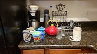 Photo showing the full selection of kitchen coffee and tea items on a kitchen counter