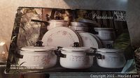 Image of the Primadonna 20 piece porcelain on steel cookware set box showing the floral porcelain cookware.