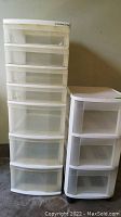 Front and side view of tall Gracious Living 7-drawer plastic storage unit beside Sterilite 3-drawer unit.