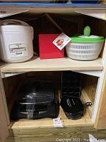 Close-up of white Presto rice cooker rice cooker.