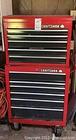 Front view of red Craftsman tool chest showing two-piece stack and drawer fronts