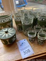 All lot contents: jasperware box, 12 tumblers, 4 shot glasses, ice bucket