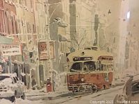 Close-up of red streetcar in snowy city street
