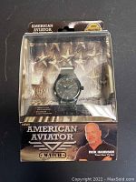 Front view of American Aviator mens watch in original packaging with Rick Harrison image and branding