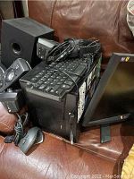 Overview showing PC tower, monitor, keyboard, speakers