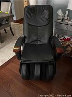 Front view showing seat cushion, foot massager section