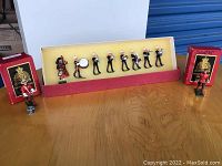 Full view of the band figurines set in the original box with two additional boxed soldiers.