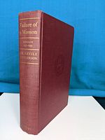 Front-cover view of the hardcover book in maroon cloth with gold embossed spine text.