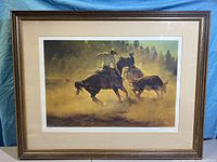 Framed art print by Bill Owen with subject of cowboys and cattle in dusty landscape