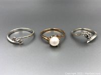 Three rings displayed side by side showing overall appearance