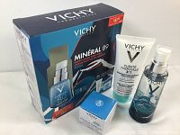 Photo showing all four items of the gift set and outer packaging with winter-themed Mineral 89 serum bottle.