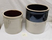 Full view of two stoneware crocks side by side showing size difference and exterior glazing.