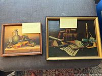 Both paintings framed, showing size and style