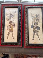 Pair of framed soldier prints in carved wood frames with red felt backing