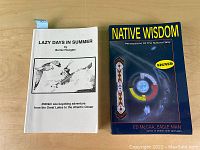 Both books together showing titles and covers with a signed sticker on Native Wisdom.