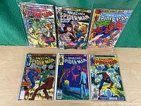 Full view of all six The Amazing Spider-Man comic books in the lot with colorful covers featuring Spider-Man and villains.