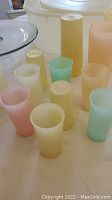 Image showing 13 small child drinking cups in pastel colors with matte plastic finish