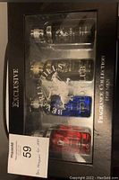 Box showing four fragrance bottles in original packaging labeled Beverly Hills Polo Club Exclusive Fragrance Collection for Men