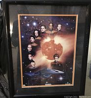Front view of the framed Star Trek Voyager print titled 'Voyager' by Dru Blair showing characters, starfield background and spaceship.