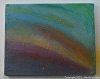 Front view of abstract canvas painting depicting Northern Lights with blended colors spanning green, blue, orange and purple tones.