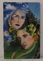 Full view of the watercolor and collage painting showing two female faces and nature elements in mixed media on paper board.