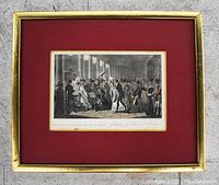 Framed antique print with red mat and gold frame showing historical scene with multiple figures