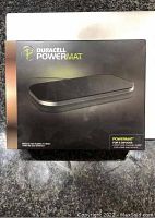 Front view of the Duracell Powermat box showing product image and branding.