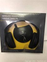 Front view of retail box showing wireless headphones and transmitter with brand logo and product name.