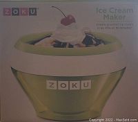Image of a Zoku branded ice cream maker on the box showing a green and white bowl with ice cream inside.