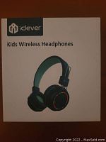 Box of iClever Kids Wireless Headphones with product name and logo visible.