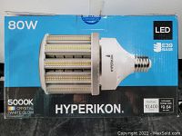 Front of box showing 80W Hyperikon LED corn bulb with E39 base and 5000K color temperature