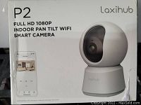 Front of packaging showing the Laxihub P2 Full HD 1080P indoor pan tilt wifi smart camera with a photo of the device and a phone app screen.
