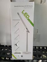 Box front showing product name 'LED FX-2022', lamp image and 'Dimmable Desk Lamp with USB Charging' text.