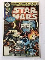 Front cover of Marvel Comics Star Wars issue #5 showing Luke Skywalker in a battle scene near the Death Star with characters in action poses.