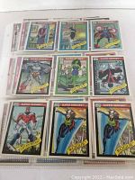 First photo showing 10 Marvel Trading Cards featuring characters such as She-Hulk, Captain Britain, Rogue, and Ant-Man.