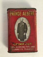 Front view of the vintage red tin showing the Prince Albert branding with portrait and product details.