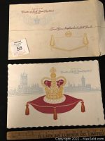Two paper placemats with coronation imagery and original shell gas station envelope.