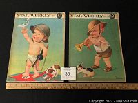 Pair of Star Weekly magazines from 1944 and 1945 showing front covers with baby soldier/baby musician illustrations and a wooden ruler for scale.