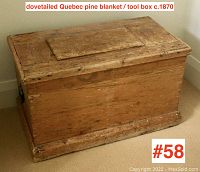 Front and side angle showing rectangular antique pine box with raised panel lid and base moulding