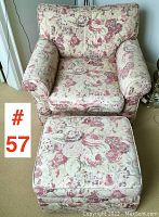 Front view of the floral print upholstered arm chair and ottoman set showing seat cushions and armrests.