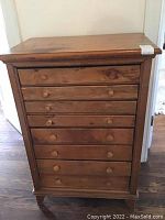 Front view of eight-drawer pine dresser