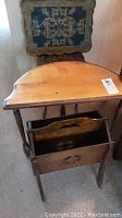 Set showing half wood table and wood magazine rack.