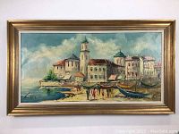 Full frontal photo of the large framed seascape painting showing the buildings, boats, and coastal scene.