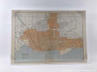 Full view of the antique Toronto city map mounted on foam board, showing city layout and waterfront.